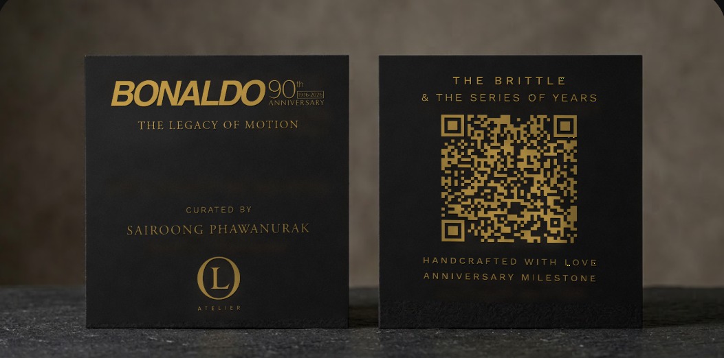 Photorealistic render — matte black textured card with gold foil